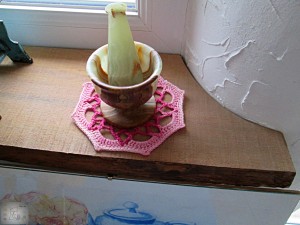 Mortar and pestle on the coaster.
